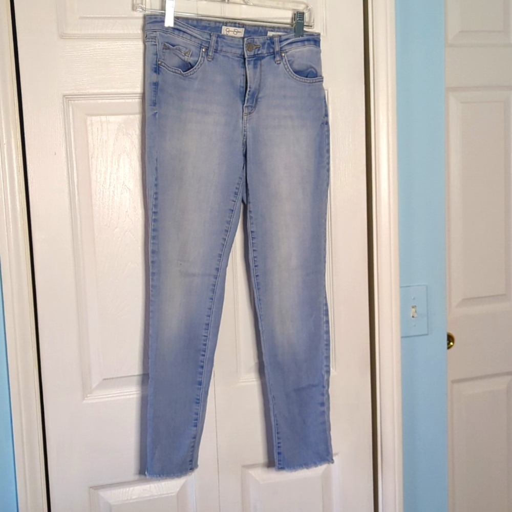 Four pairs of jeans. Size 6 and 4